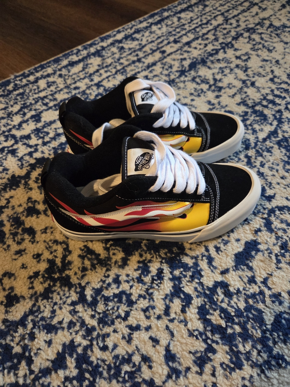 Vans Old Skool Sneakers in Black with Yellow & Red Flame Accent